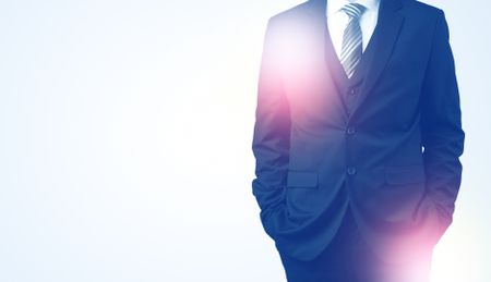 Young businessman standing and thinking without head  
