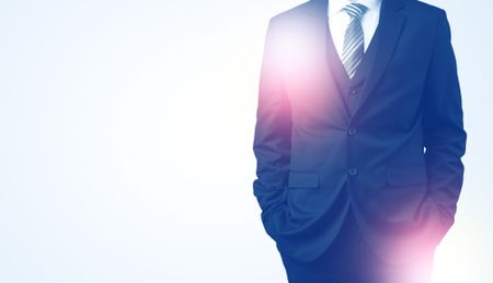 Young businessman standing and thinking without head