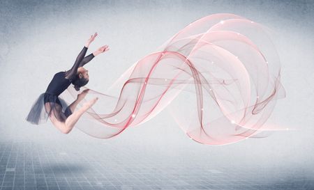 Dancing ballet performance artist with abstract swirl concept on background