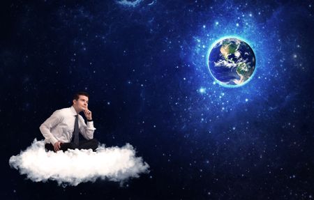 caucasian-businessman-sitting-white-fluffy-cloud-645096268 Caucasian businessman sitting on a white fluffy cloud looking and wondering at planet earth