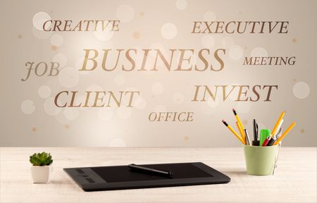 Business job office concept with close up wooden desk and materials, papers and electronic equipement