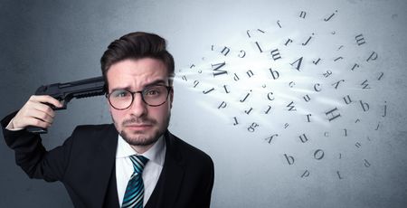 Man shoots his head with gun and letters are coming out from his head