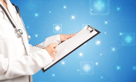 Female doctor holding notepad with blue background and crosses
