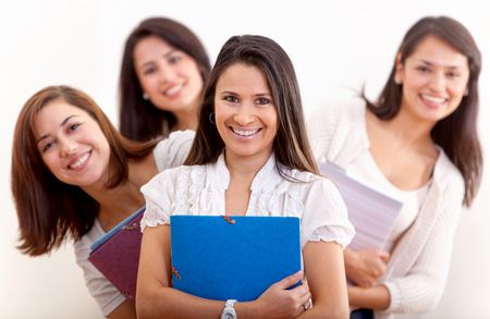 Group of female students holding notebooks - isolated