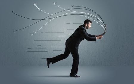 Running businessman with device and hand drawn lines concept on background