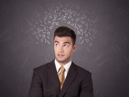 Young businessman with white alphabet around his head