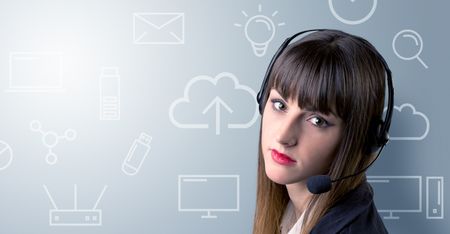 Young female telemarketer with white mixed media icons around her