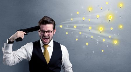 Man shoots his head with gun and idea bulbs are coming out from his head