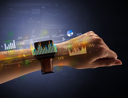 Cloe up naked female hand with smartwatch with financial symbols around