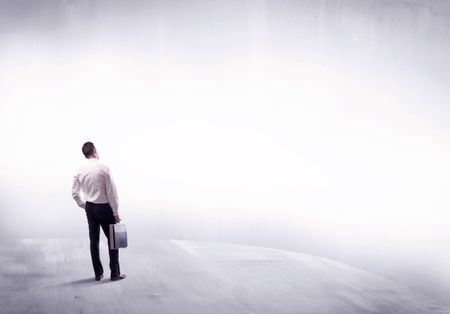 Young sales businessman in elegant suit standing with his back in empty white space background concept