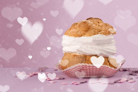 Delicious pretty party cakes with heart shape symbols on colorful background