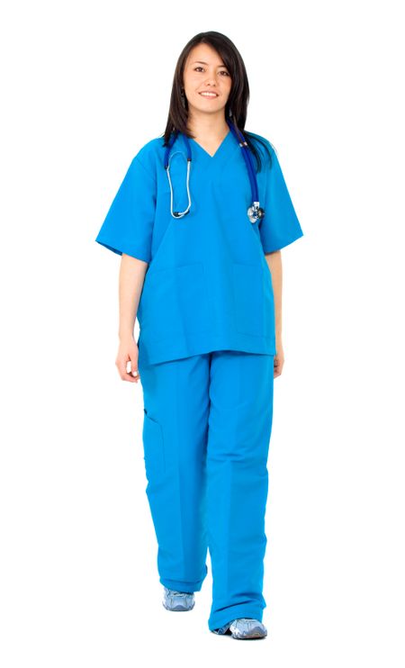 female nurse walking towards the camera isolated over a white background