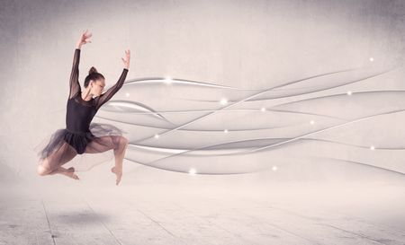 Ballet dancer performing modern dance with abstract lines concept on background