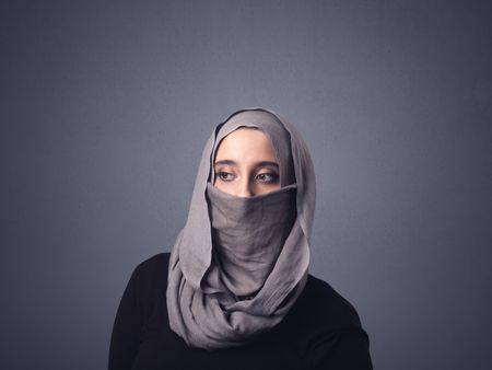 Young muslim woman wearing niqab