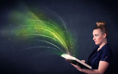 Casual young woman holding book with green wave flying out of it