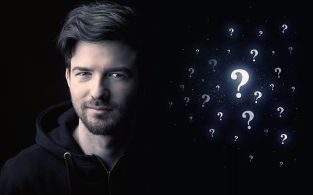 businessman-question-mark-662823541 businessman with many question mark near him