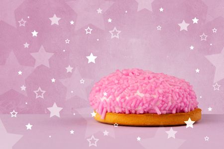 Close up of a delicious colorful cake with star shapes on background 