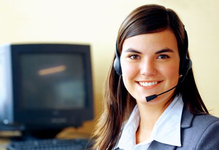 customer service representative in an office with a headset