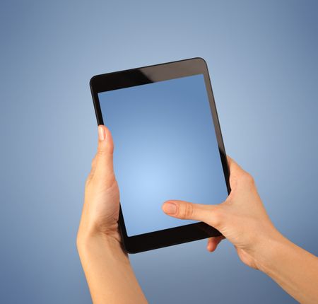 Female fingers touching blank tablet 