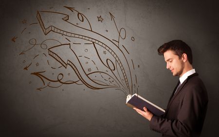 Casual young man holding book with brown arrows and stars flying out of it