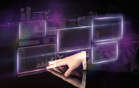 Male hands touching interactive table with purple cloudspace graphic on it 