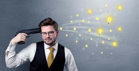 Man shoots his head with gun and idea bulbs are coming out from his head