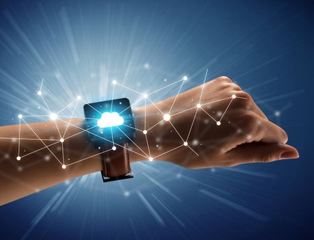 Close up female hand with smartwatch and with cloudy and connection icons around