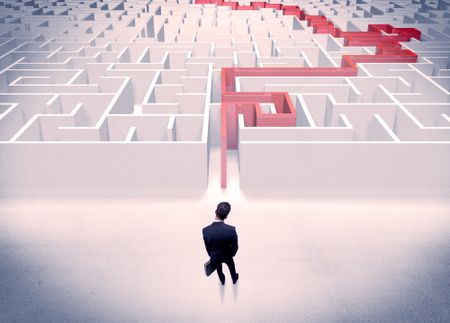 businessman-suit-giving-thumbs-front-labyrinth-672690247 A businessman in suit giving thumbs up in front of labyrinth with red line showing the way out