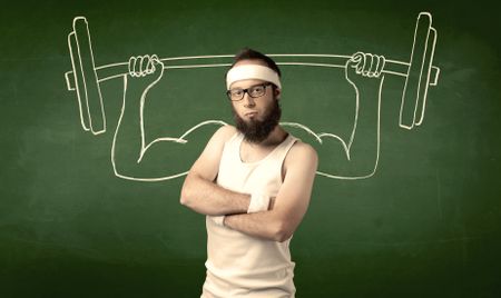 A young man with beard and glasses posing in front of green background, imagining how he would lift weight with big muscles, illustrated by white drawing concept.