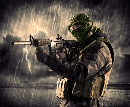 portrait-dangerous-armed-terrorist-mask-gun-674015512 Portrait of a dangerous armed terrorist with mask and gun in a thunderstorm with lightning