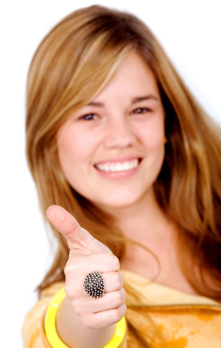 female smiling with thumbs up isolated over a white background