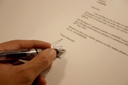 Signing a letter