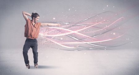 A pretty hip hop dancer dancing contemporary dance illustrated with glowing motion lines in the background concept.