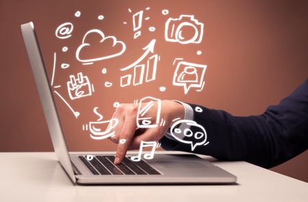 An elegant businessman sitting at desk and pushing the buttons of his laptop keyboard while working on everyday office tasksillustration concept