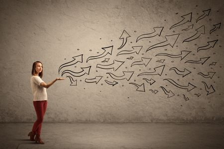Caucasian woman holding black drawn, thirving arrow band