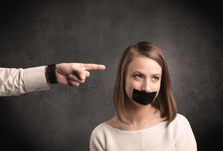 caucasian-business-hand-pointing-female-employee-675517534 Caucasian business hand pointing at female employee with grunge background