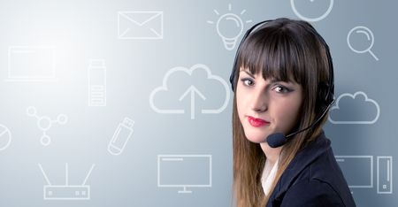 Young female telemarketer with white mixed media icons around her