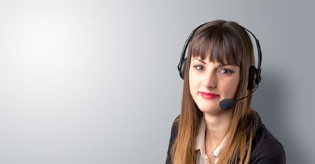 Young female telemarketer on a white background