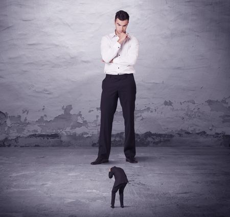 Angry big manager looking at small business man concept on background