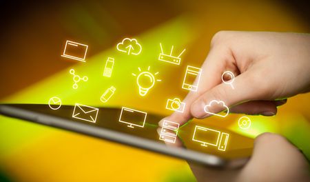 female-hands-touching-tablet-white-technology-679062034 Female hands touching tablet with white technology related icons