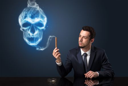 Businessman smoking with skull simbol above his head.