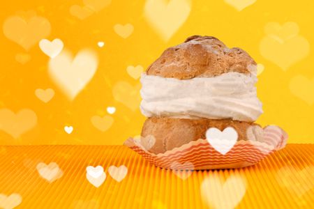 Delicious pretty party cakes with heart shape symbols on colorful background