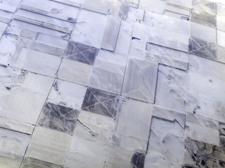 Fields of Iowa seen from 20,000 feet or higher in January