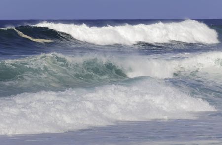 Surf rushing toward North Shore of Oahu