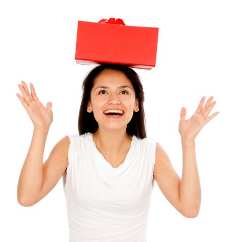 Woman with a red gift on her head - isolated over a white background