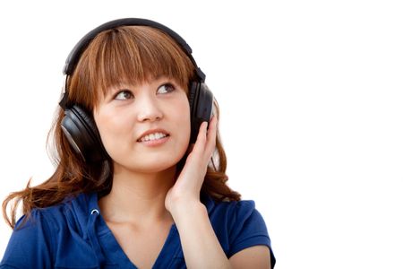 Happy Asian woman with headphones - over a white background