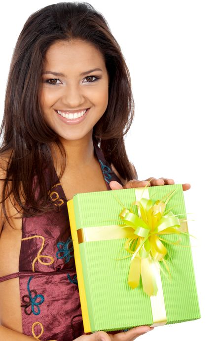 happy girl portrait smiling and holding a green gift - isolated over a white background
