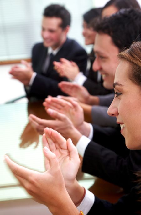 business team applauding in an office environment