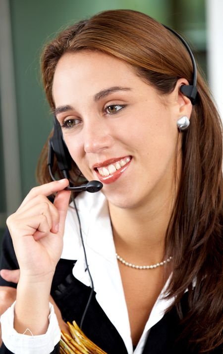 customer service representative smiling with a friendly face in an office