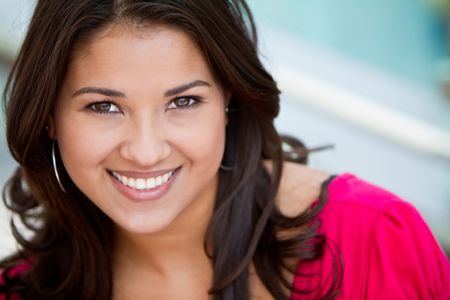 Portrait of a beautiful young woman smiling